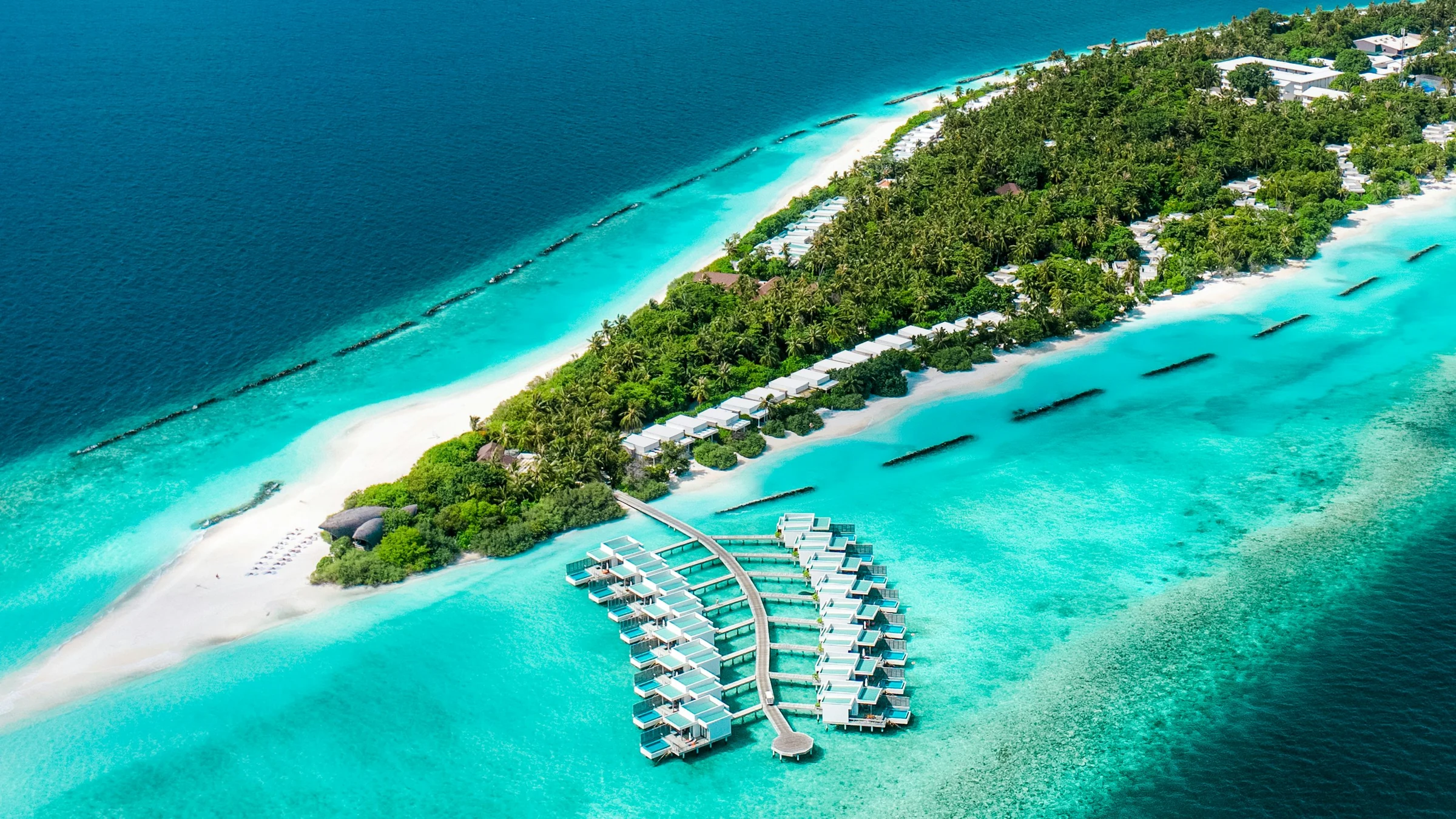 An aerial view of a tropical island in the Maldives